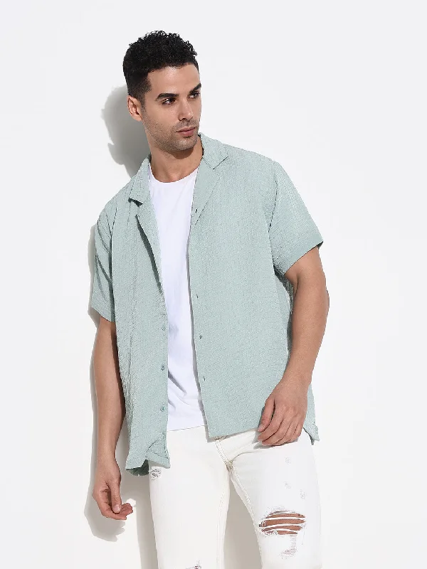 Men's Distressed Denim Casual Shirts with Frayed Edges for a Trendy and Rugged LookMen Green Solid Cuban Collar Shirt