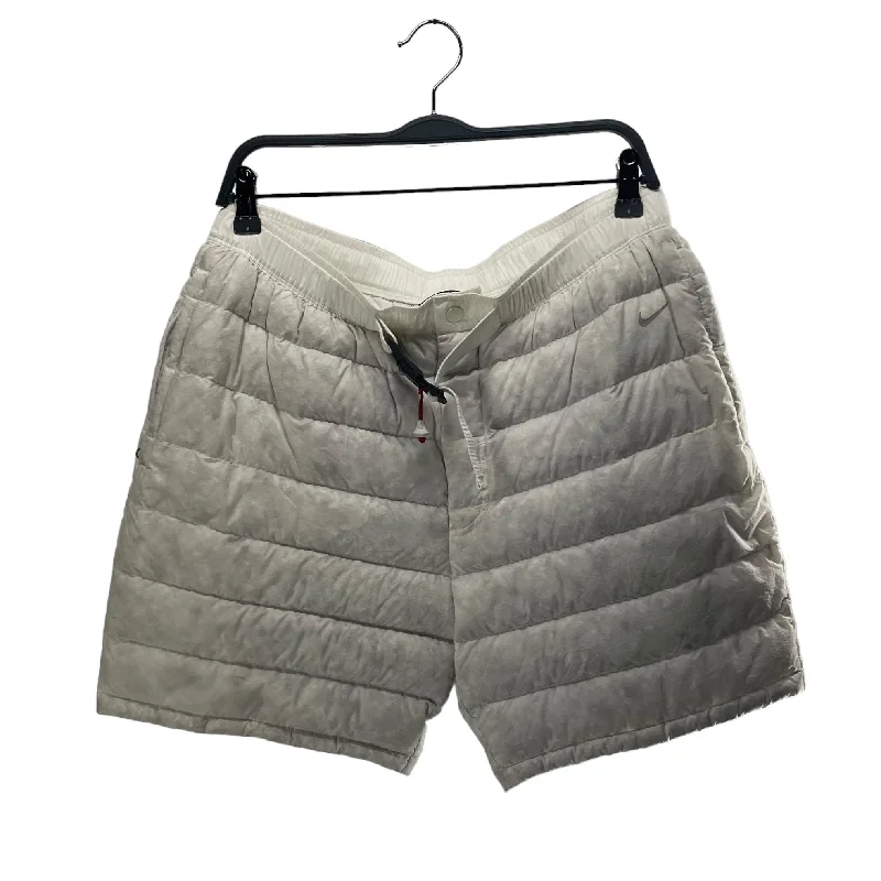 Men's ripped denim shorts for a trendy streetwear aestheticNIKE/Shorts/L/Nylon/WHT/PUFFER SHORTS/TOM SACHS