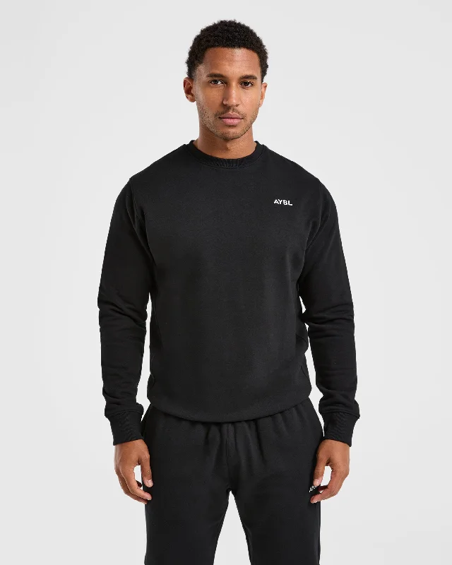 Oversized men hoodie with dropped shoulders for a streetwear lookEssential Lightweight Sweater - Black Oversized men hoodie with dropped shoulders for a streetwear lookEssential Lightweight Sweater - Black