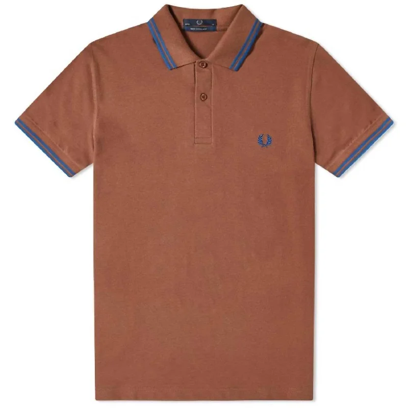 Men's button - front t - shirts with a unique artistic printMen's Twin Tipped Polo Shirt In Root Beer/blue
