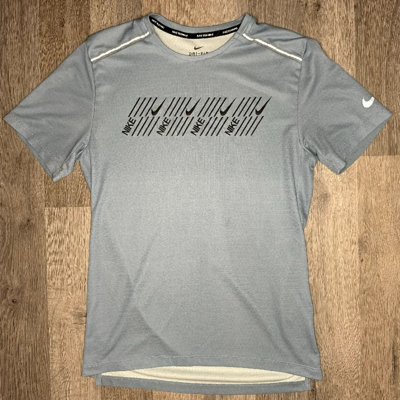 Men's eco - friendly recycled t - shirts for sustainable fashion choicesNike Miler Graphic Tee Worn Blue (Used) Men's eco - friendly recycled t - shirts for sustainable fashion choicesNike Miler Graphic Tee Worn Blue (Used)